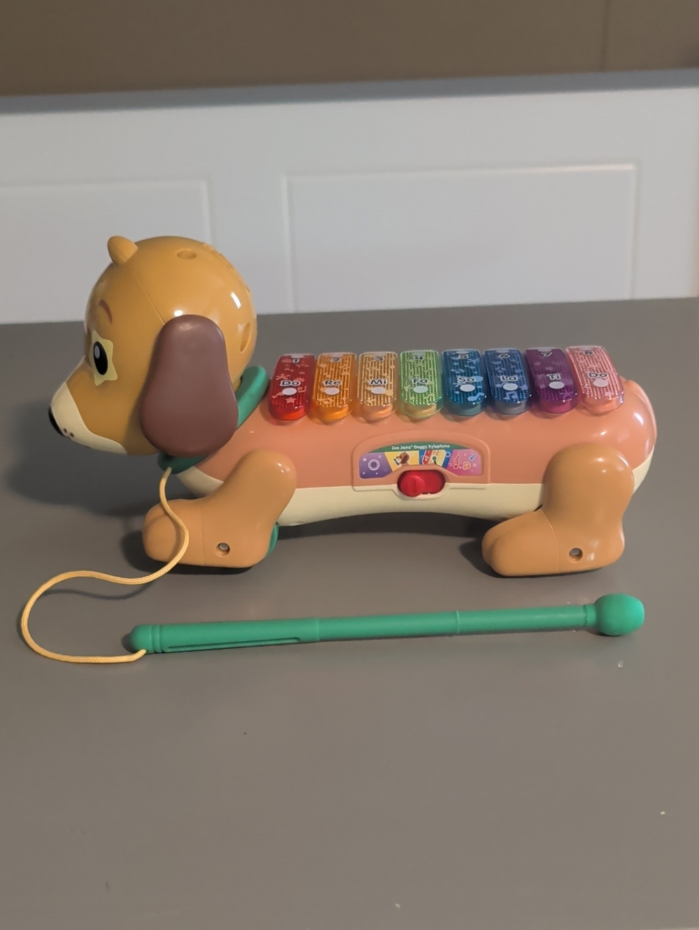 Pull-Along Puppy Xylophone Toy in Peach with Rainbow Keys